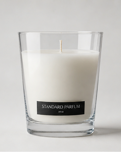Standard Parfum candle at rest in low light
